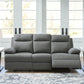 Side-Swipe Reclining Sofa with Drop Down Table