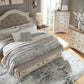 Realyn Upholstered Bed